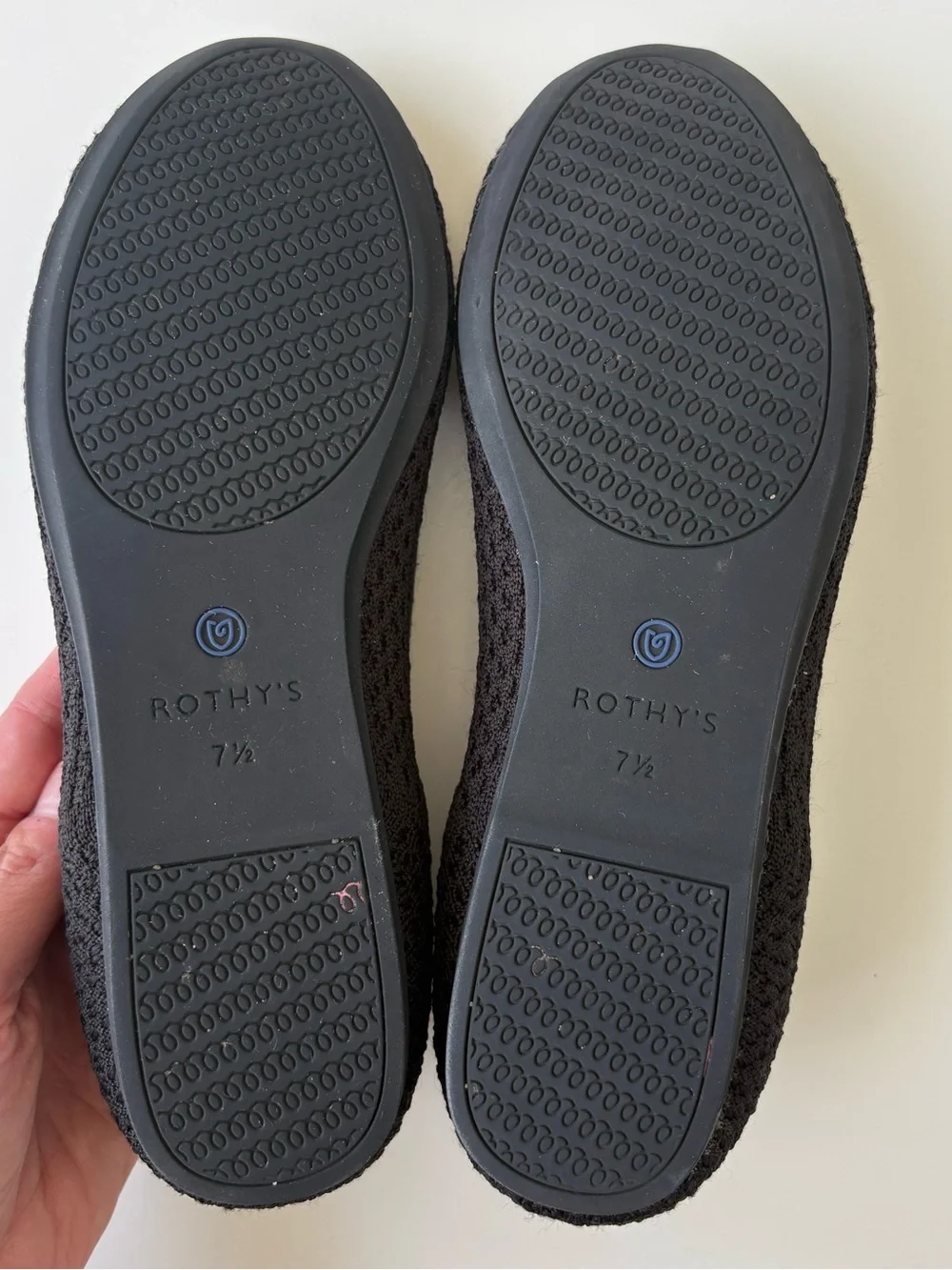 Rothy's Black Knit Ballet Flats with Blue Heel Trim. Womens size 7.5